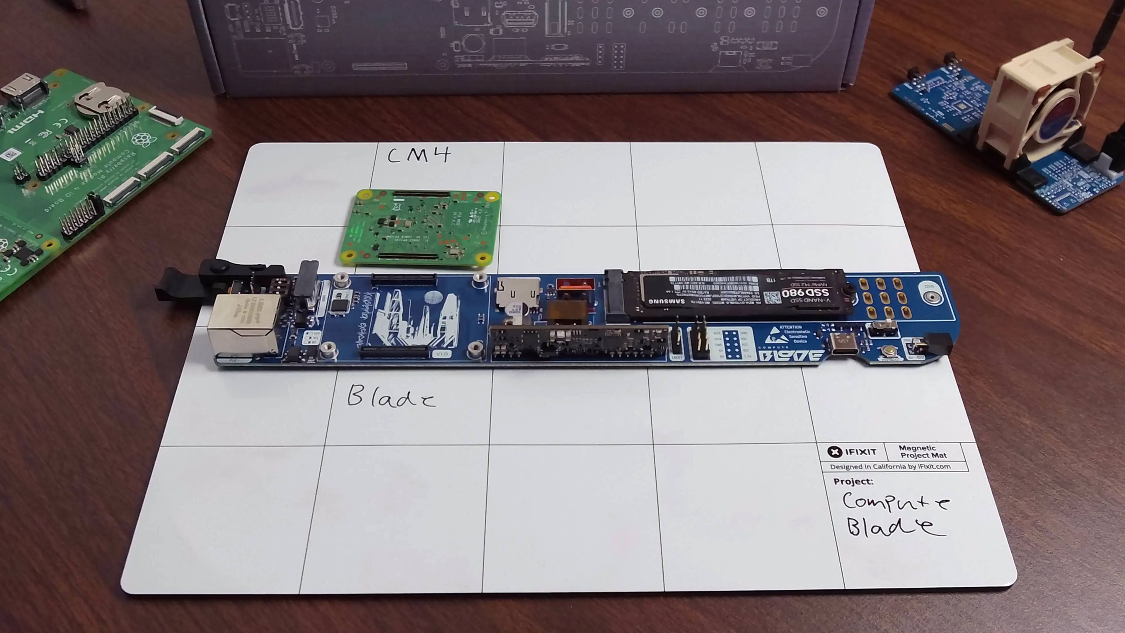 Blade with cm4 above and flipped over showing board to board connecter